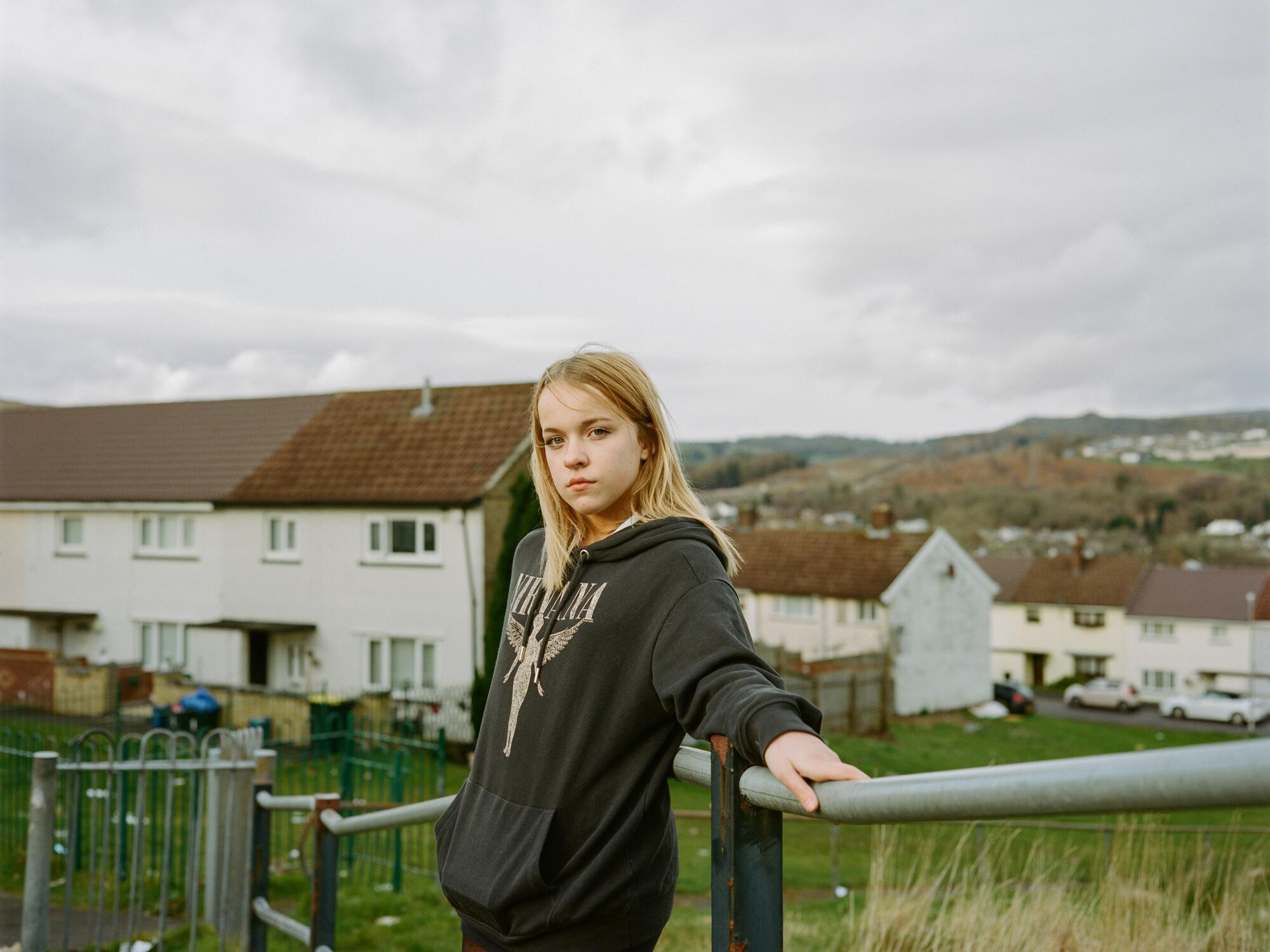 Scarlett, 12, standing on a footpath in her home town in Wales