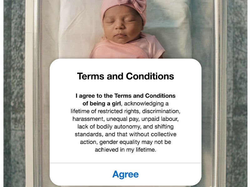 Baby in cot with list of terms and conditions overlaid like a pop up over them