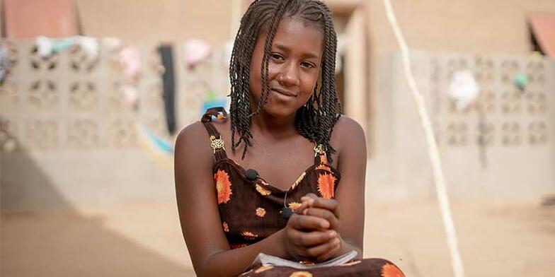 Girl smiles at the camera