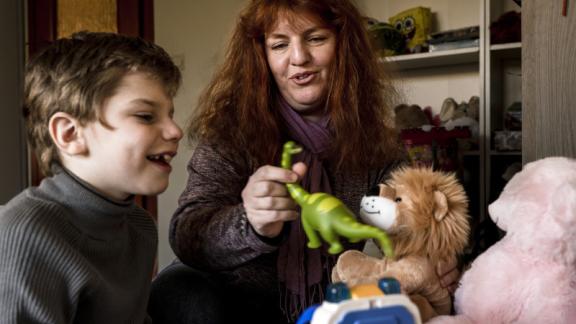 Natalia plays with her son Pavel, age 5.