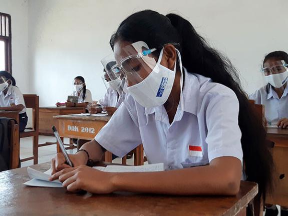 In Indonesia, Angelina has returned to school