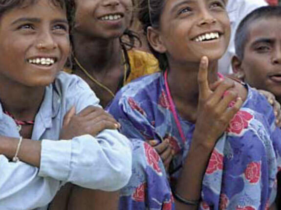 School children in Bangladesh smiling in a group