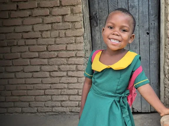 In Malawi, Asante is thriving at school, she’s building friendships and enjoying her learning. 