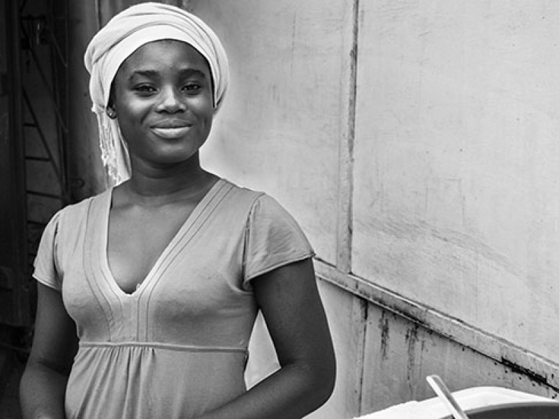 Ghana-Doris runs her mother’s food stall selling ‘Burkina’ (local porridge) when she isn’t at school