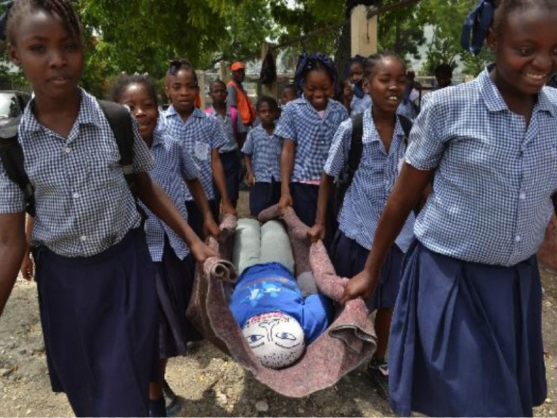 Children learn how to evacuate after a disaster in Haiti
