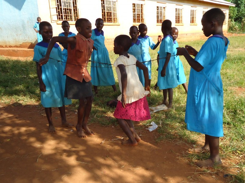 Girls play at a Plan International supported school in Uganda 
