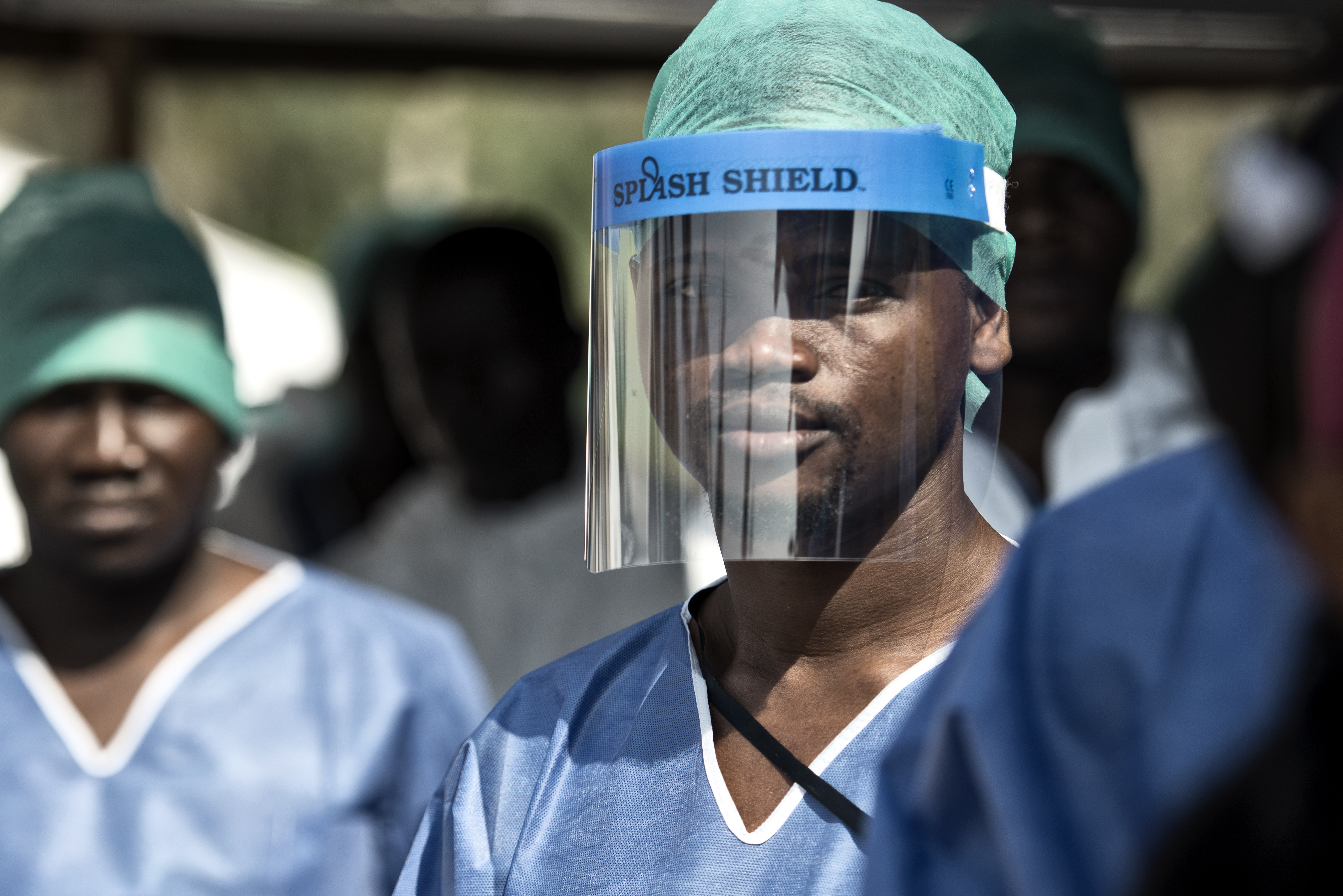 Healthcare worker with splash guard in Sierra Leone