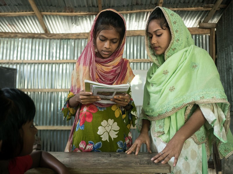Tanzila teaching at an accelerated learning school in Bangladesh