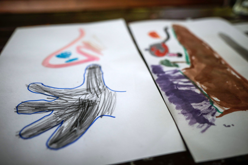 Drawings made by children at the refugee centre where Romona works