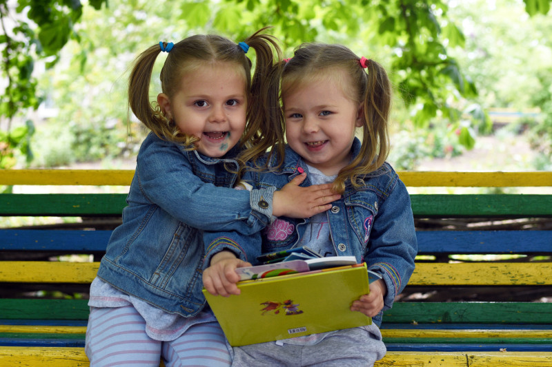 3 year-old twins Liliana and Diana play at the Amici di Bambini kindergarten, in Moldova.