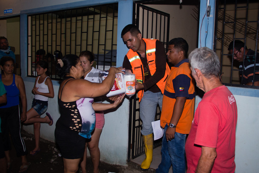 Families affected by flooding in Ecuador receive hygiene kits