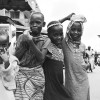 Ghana-Group of (unknown) young children passing in Nima