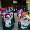 Children practice an evacuation for a disaster