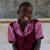 Eudel, a sponsored child, smiling Plan International UK