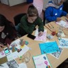 Poppy making posters at the Residential