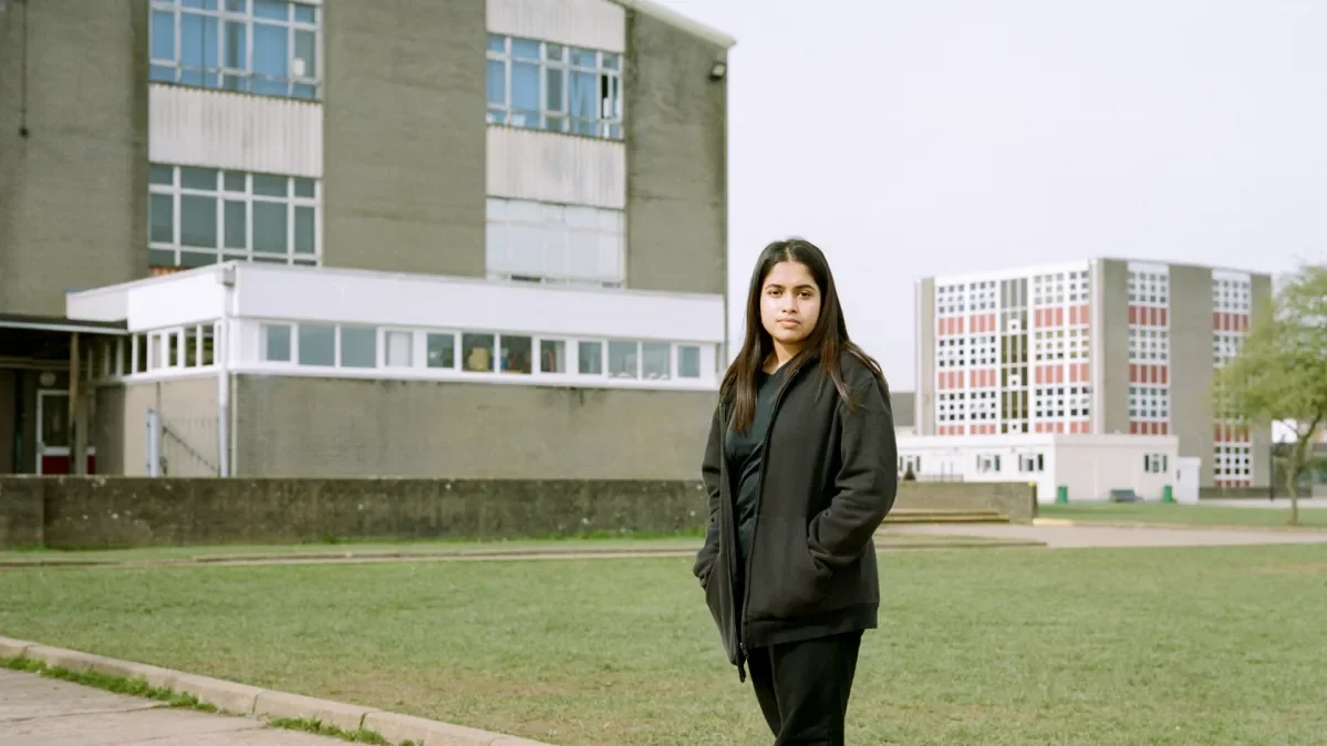 Jaiza, 13, standing outside her school in Cardiff