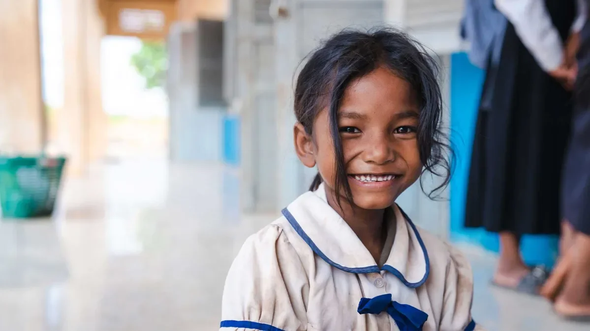 Thouthea, 7, Cambodia, at a primary school built by Plan International.