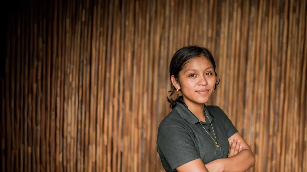 A girl stares at the camera