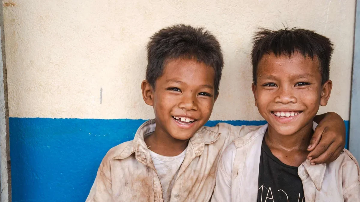 Nhem, 9, and Sokheng, 9, at their primary school in Stung Treng Province which was built by Plan International.