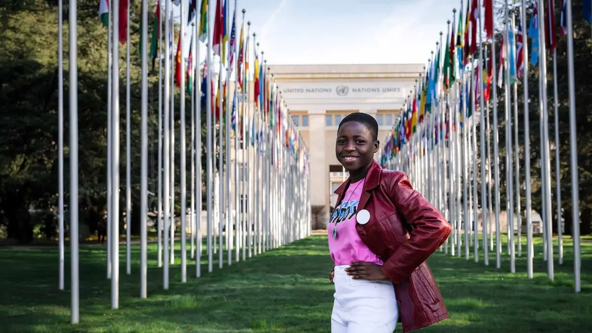 13-year-old Marie-Reine from Togo standing in front of the United Nations building in Geneva
