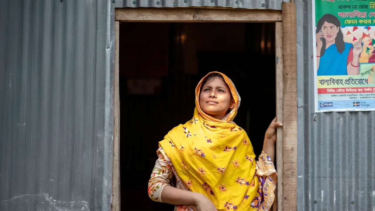 Monalisa standing in doorway looking into distance