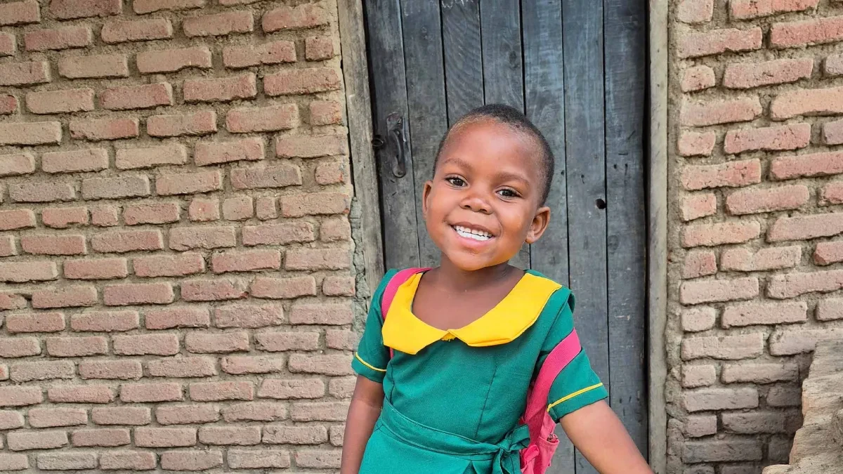 Asante, 5, Malawi in her school uniform.