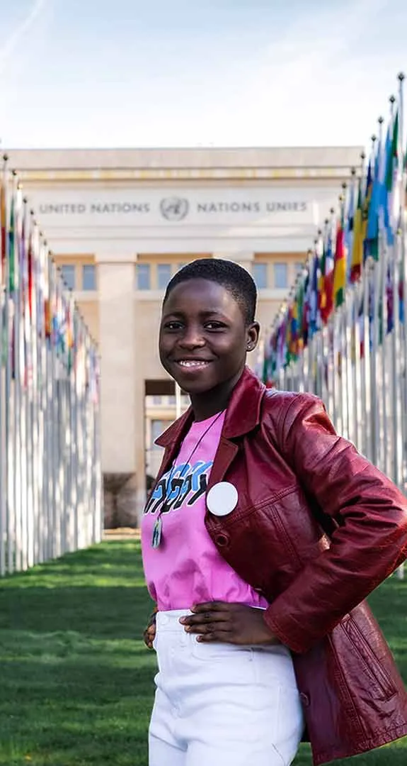 13-year-old Marie-Reine from Togo standing in front of the United Nations building in Geneva