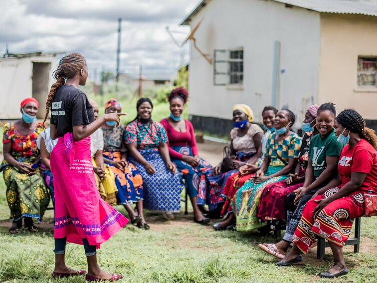 Plan International staff member Chabala trains traditional initiators in Zambia. 