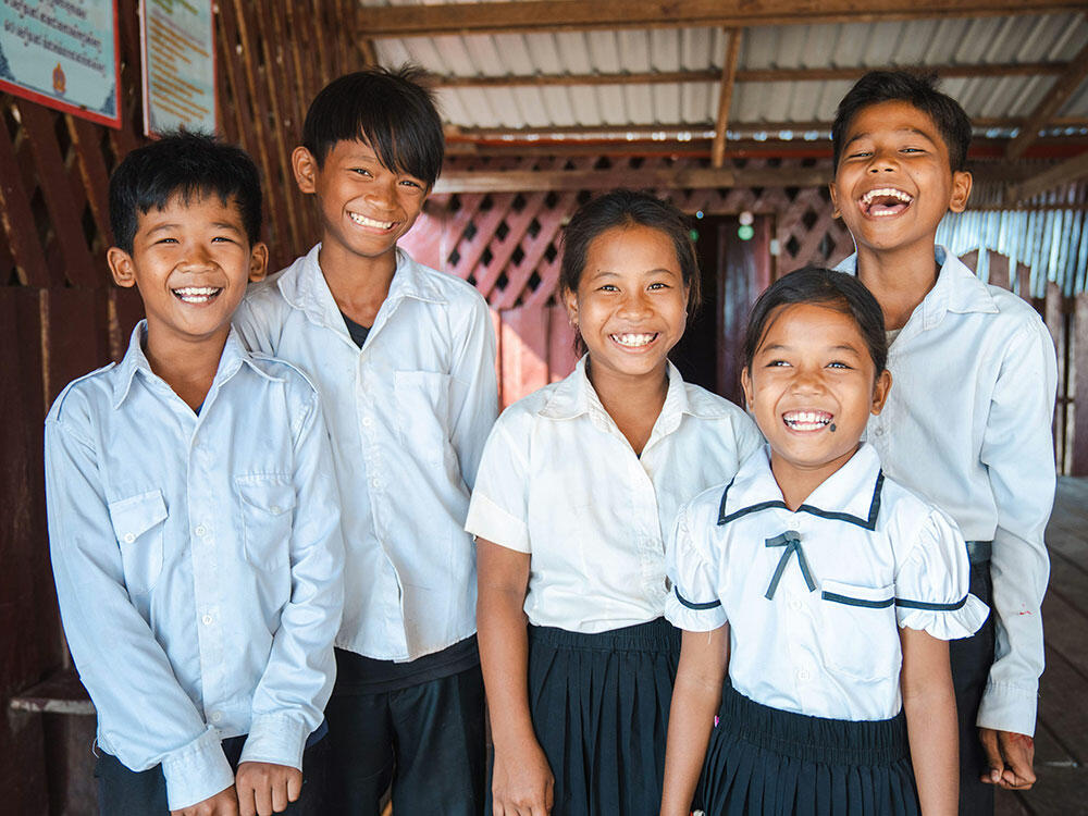 Children laugh at school in Cambodia