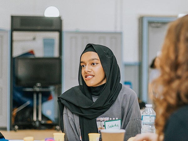 A girl takes part in a workshop