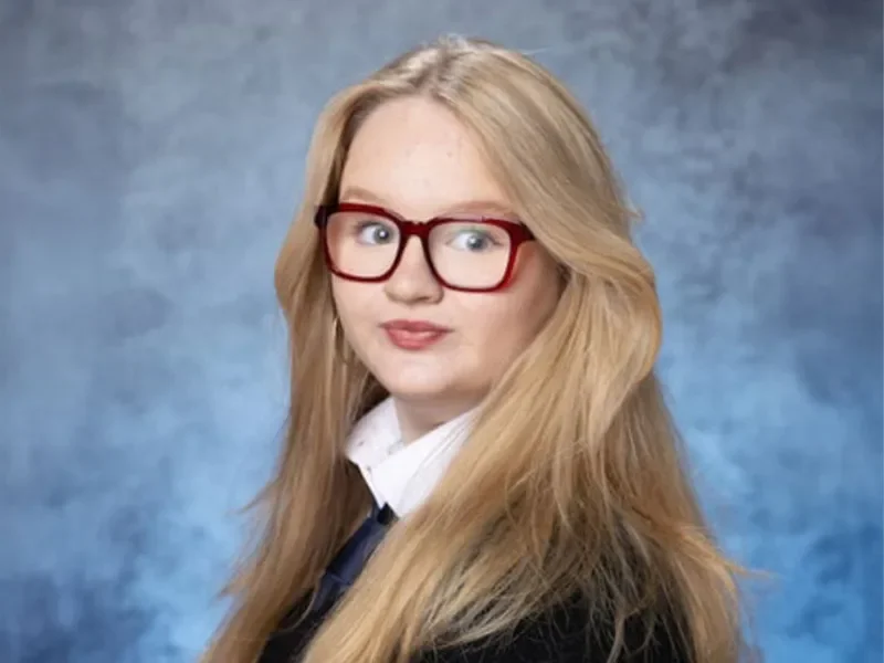 Poppy in front of blue background