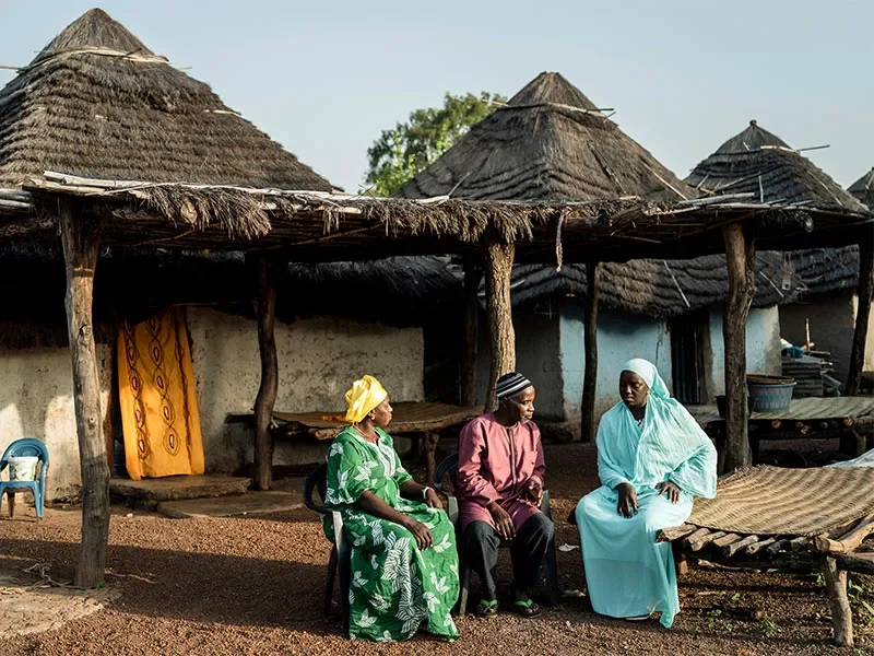 Bamba chatting with his wife, and sister-in-law