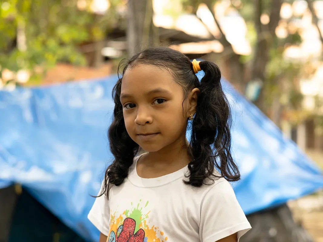 Ambar, 7, lives with her family in a displacement camp