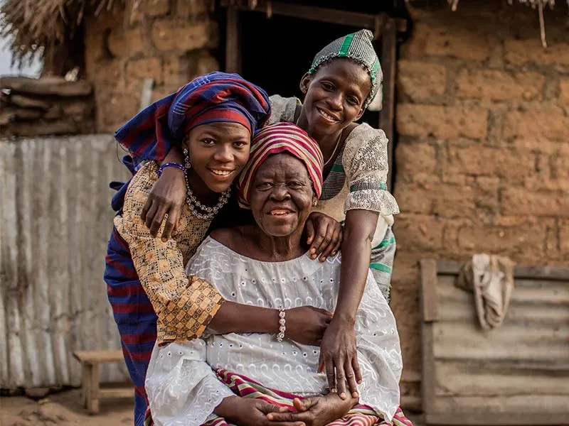 Inna sat down with Esther and Denise hugging her from behind.